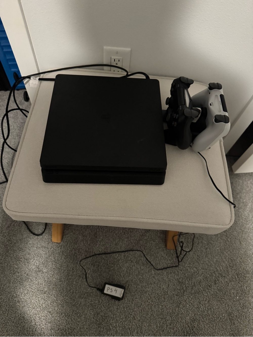 Sony PlayStation 4 Slim Black Console with Black and White DualShock Controllers